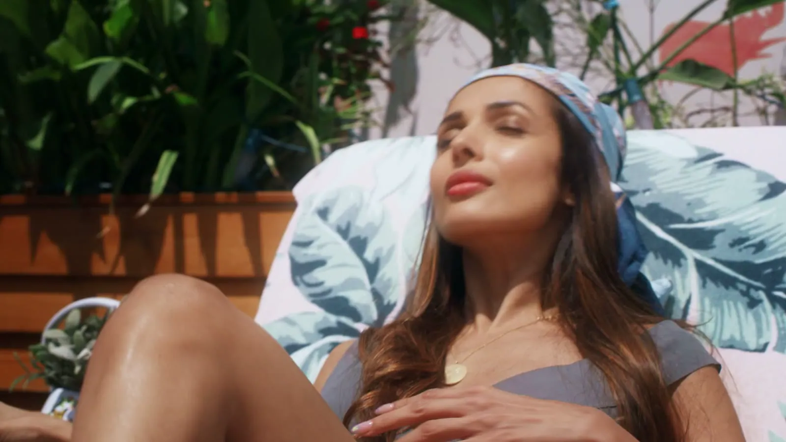 Discover LA spot — Malaika Arora in a yellow jacket at a rooftop pool