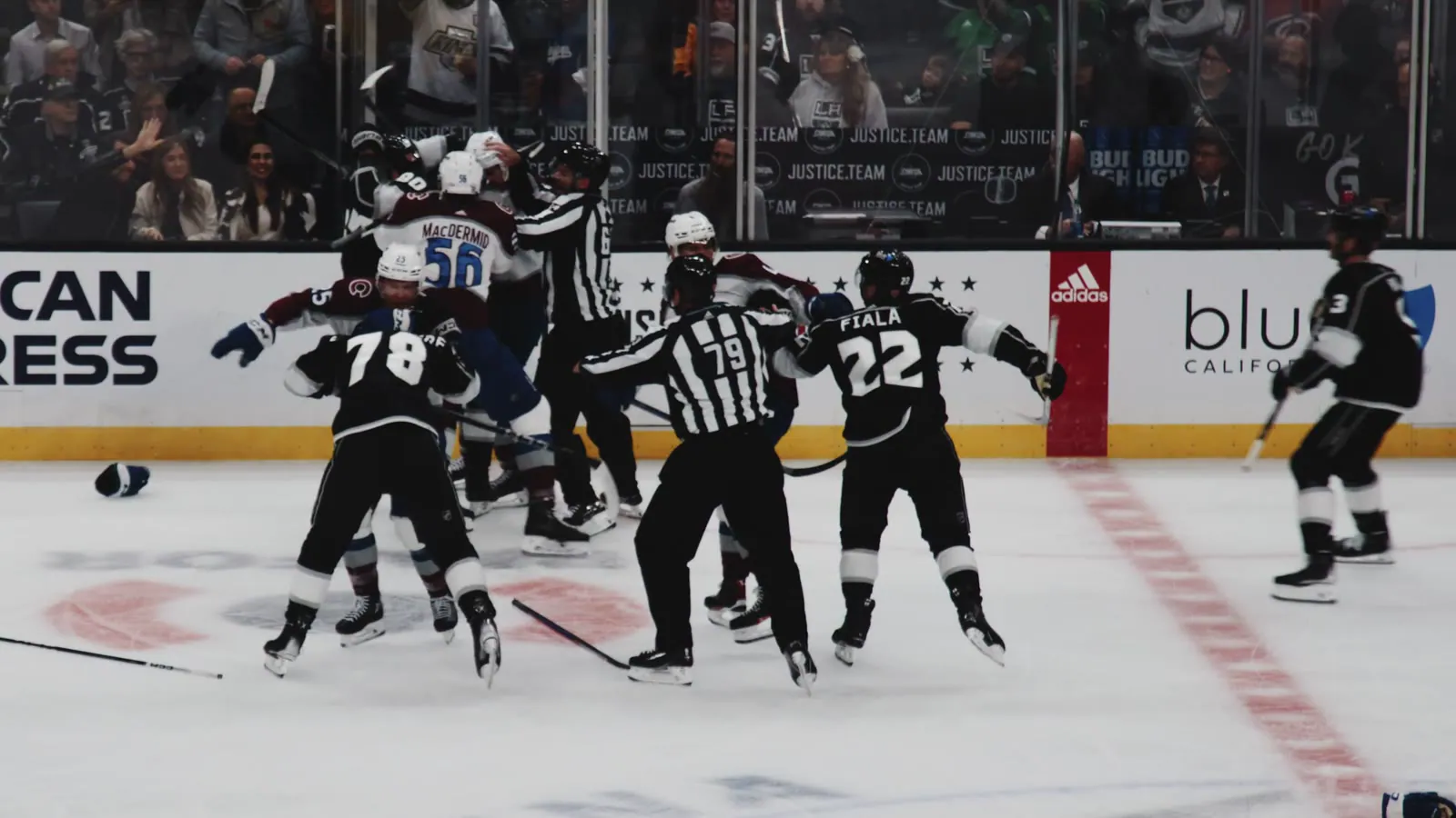 Who Is Anže Kopitar? Anže Kopitar celebrates, arms raised, in the Kings' black uniform
